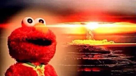 Elmo staring with the backdrop of a nuclear explosion 
